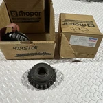 Nos Mopar #4295104 1964-77 A833 4SPD Reverse Idler Gear. Fixed Price $50.00.
