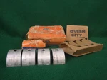 1939-1942 Ford 90 Hp Flathead Front,center Crank Bearing Set 81A-6333-E Nos. Fixed Price $34.00.